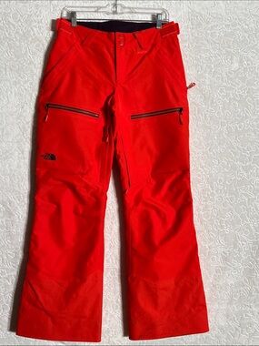 The North Face Orange Ski Pants with Zippered Thigh Pockets
